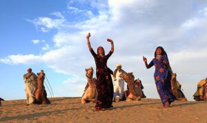 Jaisamer,India-February 26,2013: Cultural dance at Sam Sand Dune .The event is part of the Desert Festival held in winter to attract both domestic and international tourists